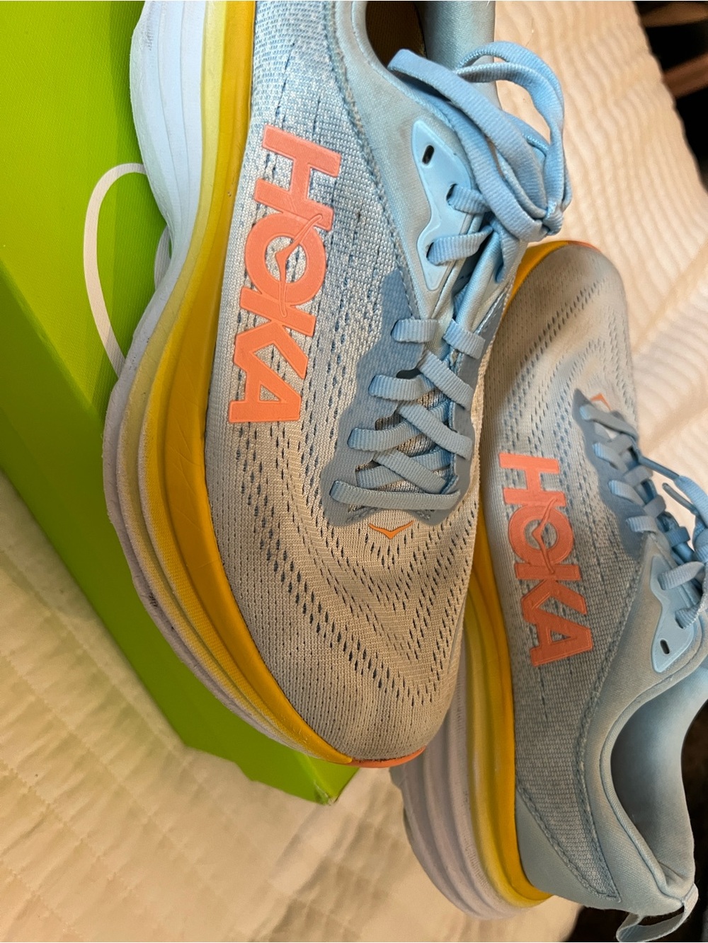 Hoka Light Blue Sneakers with Yellow Midsole and Coral Logo